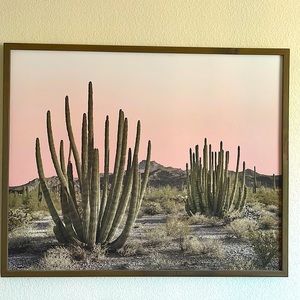 A boho cactus in desert painting with pink horizon. New and in great condition.